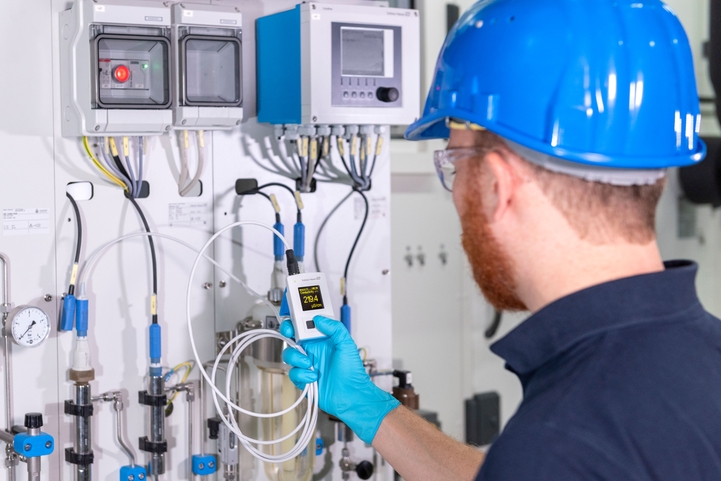 Laboratory employee checks ph values in the laboratory