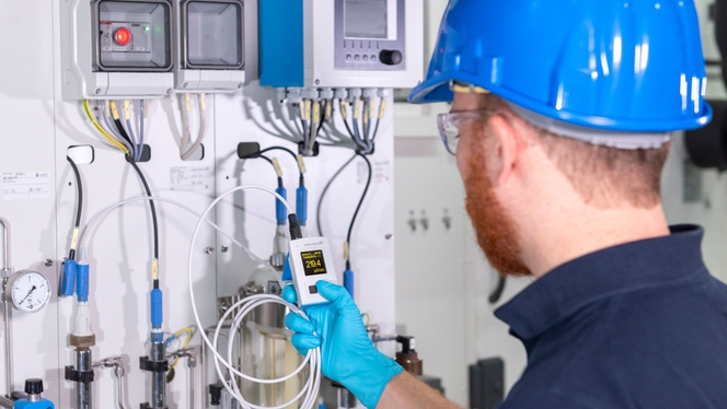 Laboratory employee checks ph values in the laboratory