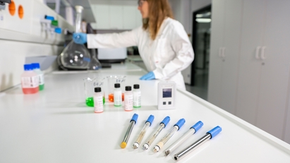 Portable pH meter with electrodes in a laboratory